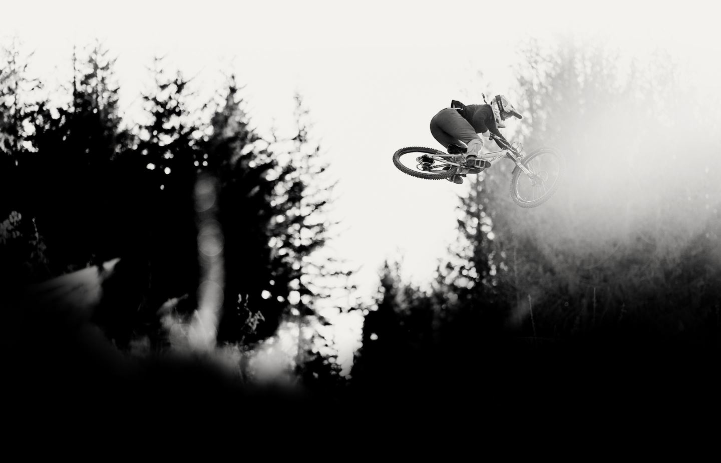 MTB Rider in mid air, black and white image